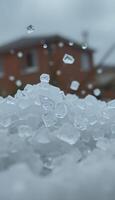 pile of ice sitting in front of a building photo
