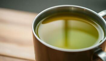 A close up of a cup of green tea photo
