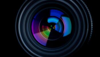 close up of a camera lens with a multicolored lens photo