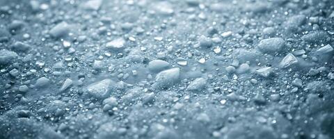 Raindrops on a surface with a blue background photo