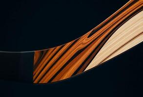close up of a wooden object on a black background photo