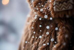 close up of a furry animal with snow flakes on its fur photo
