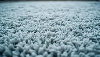 A close up of a carpet with white shaggy fibers photo