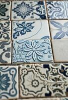 close up of a tiled floor with blue and white tiles photo