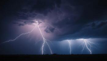 Lightning strikes over a field in the dark sky photo