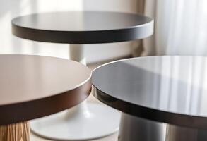 close up of two tables near a window photo