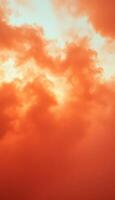 A plane flying through the sky with orange clouds photo