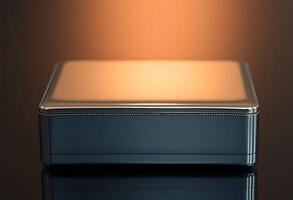shiny metal box sitting on top of a table photo