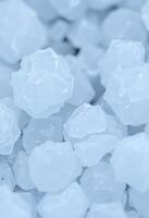 A close up of a pile of ice cubes photo