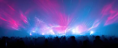 The vibrant energy of a concert illuminated by colorful laser lights. photo