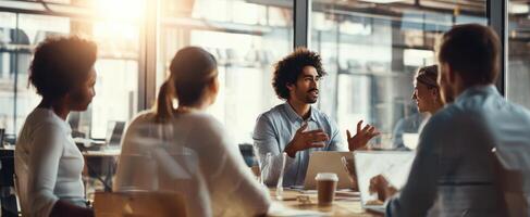The engaged team collaborating in a modern office meeting setting. photo