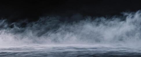 The Ethereal Mist Gliding Over a Dark Surface in a Dramatic Landscape photo