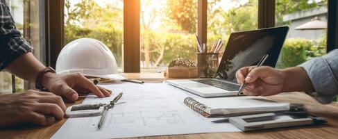The teamwork behind architectural design and planning in a sunlit workspace. photo