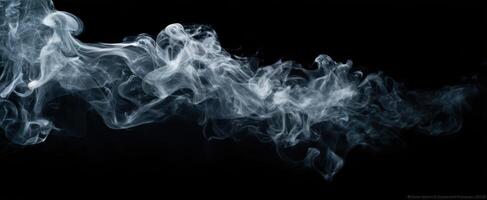 The ethereal dance of smoke gracefully swirling against a dark background. photo