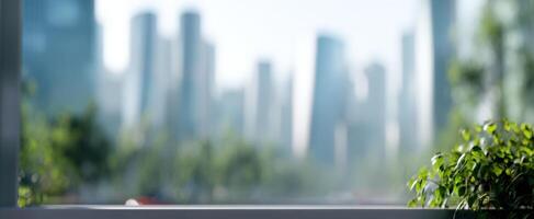 The serene view of lush plants against a blurred city skyline. photo