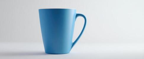 The blue mug displayed in a minimalist and modern kitchen setting. photo