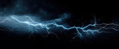 The breathtaking display of lightning striking through dark storm clouds. photo