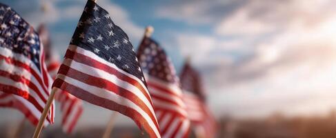 The American flag waving proudly against a beautiful sky backdrop photo