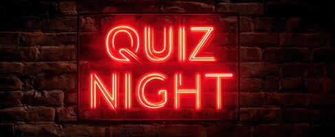 The glowing neon sign announcing quiz night in a vibrant bar setting. photo