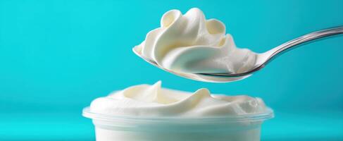 The creamy texture of freshly whipped cream ready to enhance desserts. photo