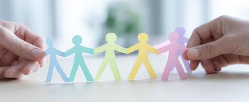 The Colorful Paper Figures Representing Unity and Togetherness in Community photo