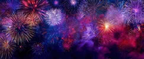 The vibrant display of colorful fireworks lighting up the night sky photo