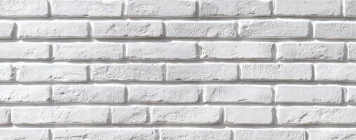 The textured white brick wall in a modern interior setting. photo