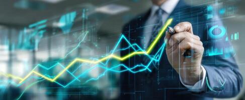 The businessman drawing growth trends on a digital financial graph in the office. photo