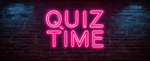 The Neon Sign Illuminating Quiz Time in a Vibrant Atmosphere photo