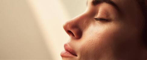 The Serene Profile of a Woman Illuminated by Soft Natural Light photo