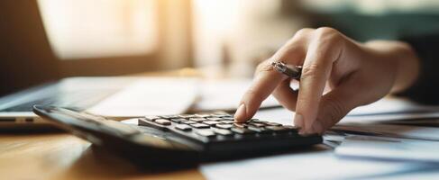 The calculator in use for precise financial calculations and planning. photo