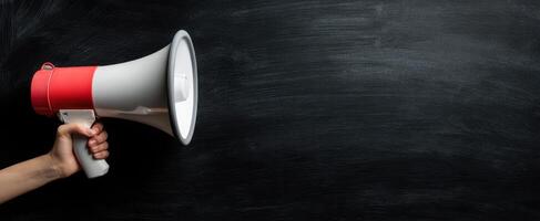 The megaphone representing powerful communication and influence in public speaking. photo