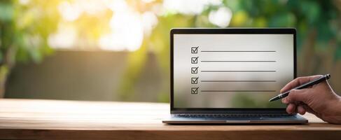 The laptop with a digital checklist for enhanced productivity and organization. photo