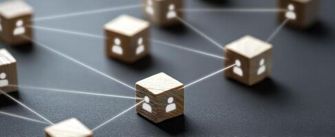 The interconnected wooden cubes representing social networking and collaboration concepts. photo