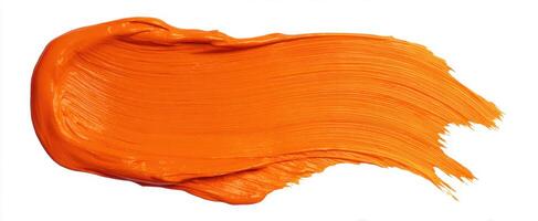 The vibrant orange paint stroke creating a stunning abstract design. photo