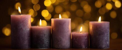 The serene glow of purple candles illuminating a cozy atmosphere photo