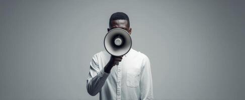 The Man Holding a Megaphone in a Modern Studio Setting photo