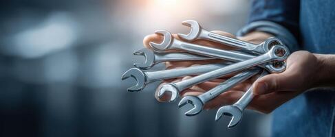 The Collection of Wrenches Held in Hands Ready for Use photo
