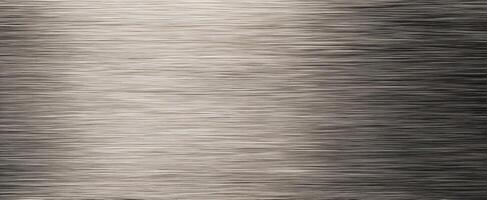 The sleek brushed metal texture with a modern industrial aesthetic photo