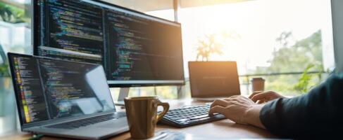The programmer's workspace with dual monitors for efficient coding and productivity. photo