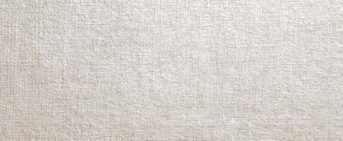The textured linen fabric creating a soft and elegant background for design. photo