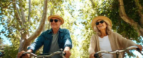 The joyful couple enjoying a bike ride through a serene park on a sunny day. photo