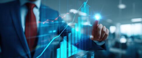 The business professional interacting with a digital financial growth chart. photo