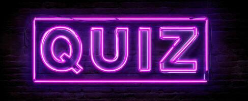 The Neon Quiz Sign Illuminating a Playful Atmosphere for Fun Nights photo