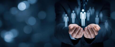 The Hands Holding Icons of People in a Professional Environment photo