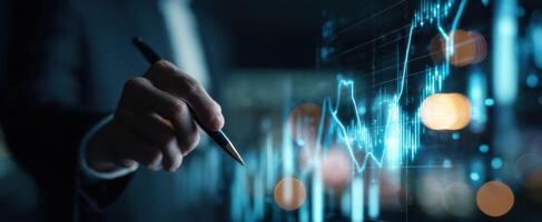 The businessman analyzing financial data trends with a digital graph. photo