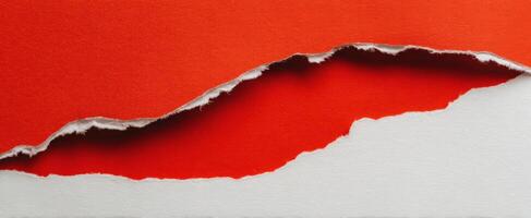 The Eye-Catching Contrast of Torn Red and White Paper photo