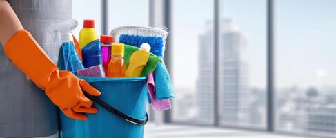 The cleaning bucket filled with colorful supplies ready for use in a modern space. photo