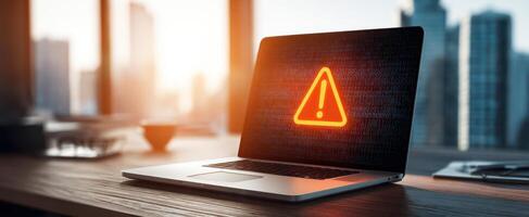 The laptop displaying a warning alert in a modern office setting. photo