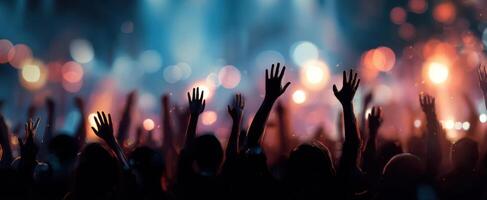 The Energetic Crowd Cheering at a Vibrant Concert Event photo